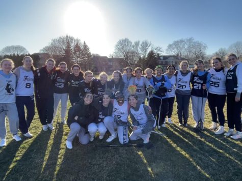 Navigation to Story: Varsity Girls Lacrosse Plays to Defend the Shield